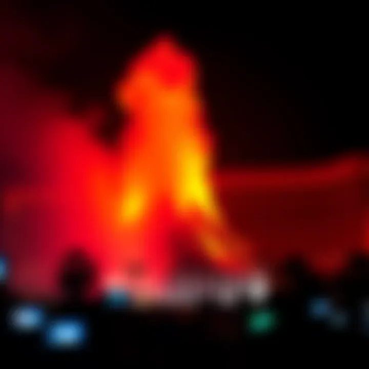 The breathtaking eruption of the Mirage Volcano at night, showcasing vibrant flames and dramatic lighting.
