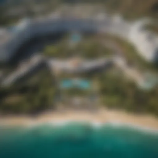 Aerial view of a luxurious casino resort in Oahu surrounded by tropical landscapes